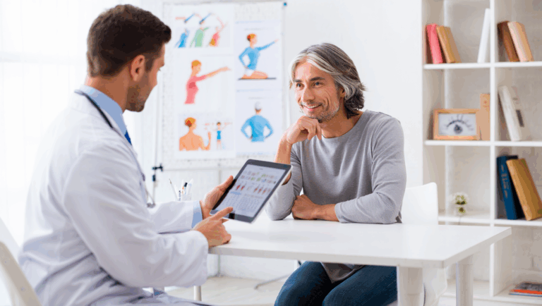 Chiropractor consulting patient about healthy lifestyle choices